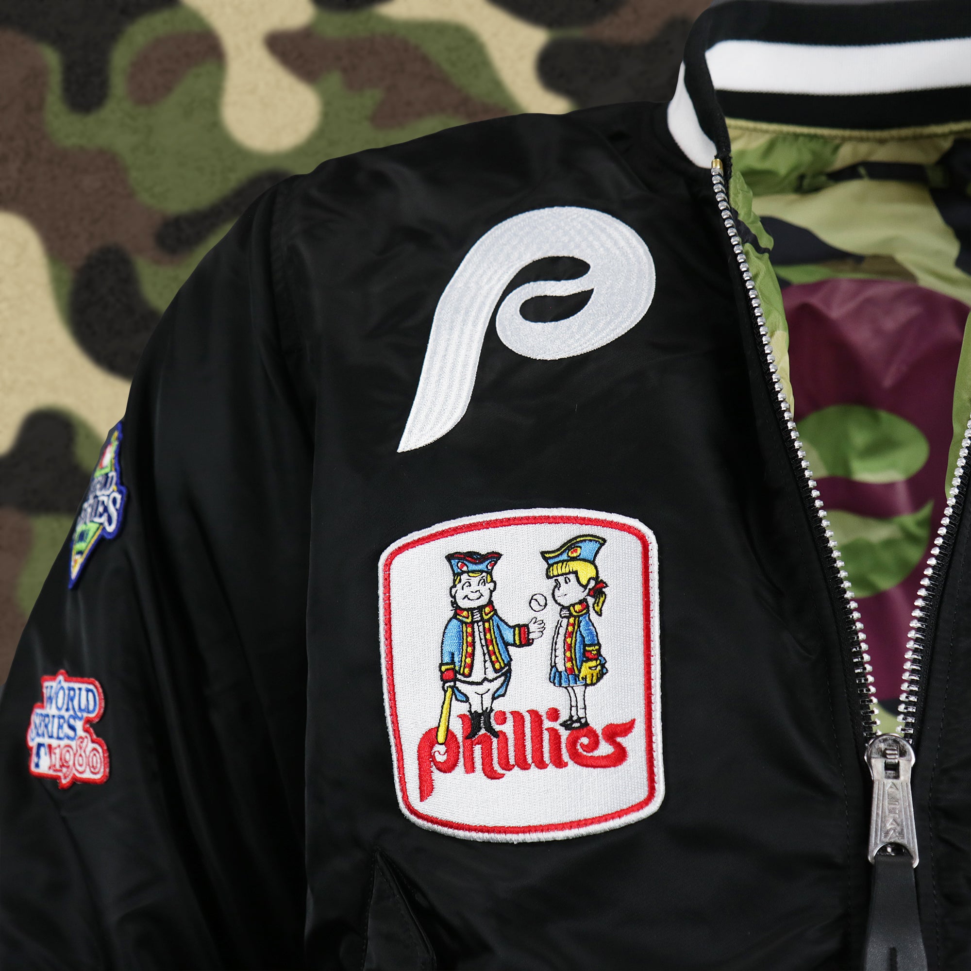 Cooperstown Philadelphia Phillies MLB Patch Alpha Industries Reversible Bomber Jacket With Camo Liner | Black Bomber Jacket